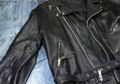 Leather jacket maintenance and care essentials, including cleaning, conditioning, and storage tips.